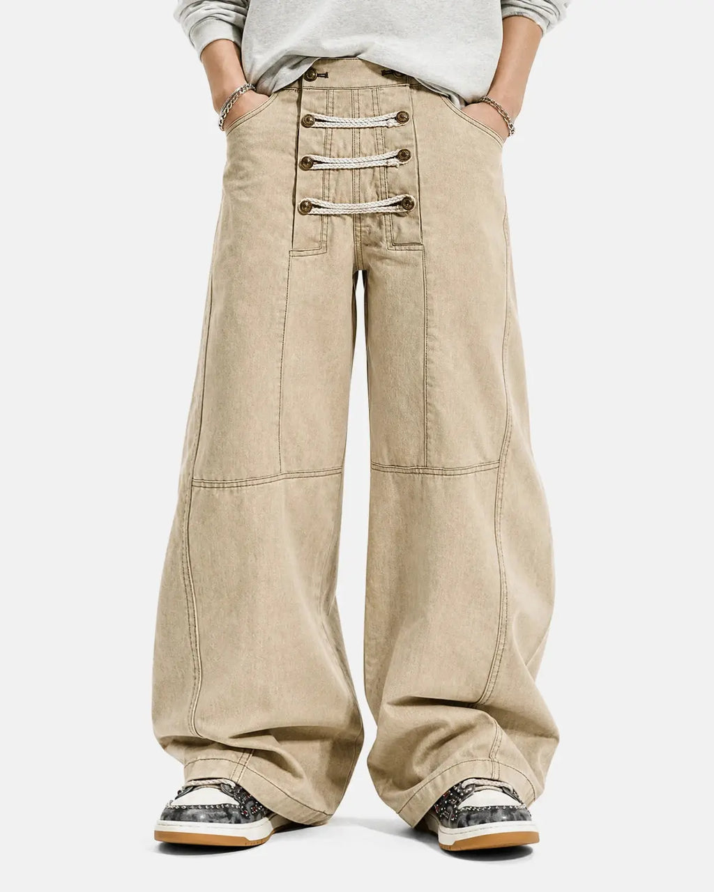 Black braided rope barrel pants by Flation Streetwear featuring a relaxed fit and unique braided rope detailing.