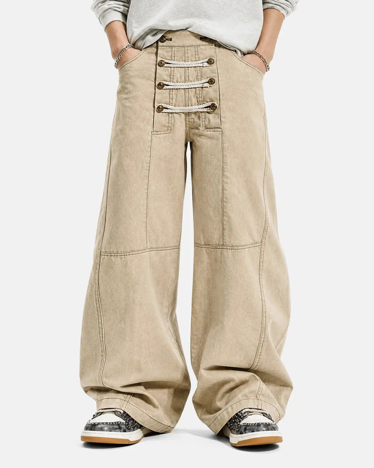 Black braided rope barrel pants by Flation Streetwear featuring a relaxed fit and unique braided rope detailing.