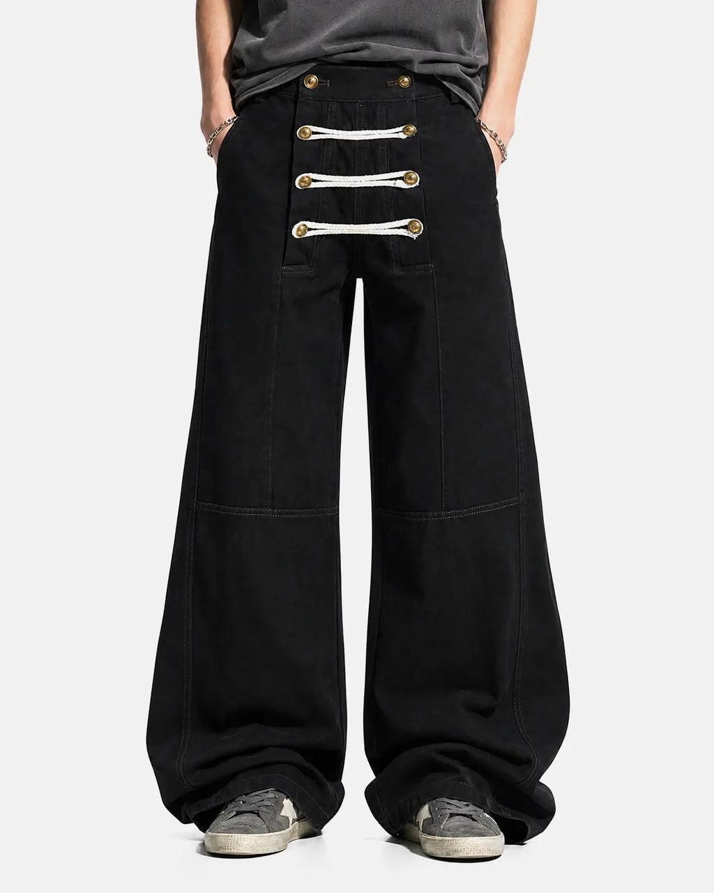 Black braided rope barrel pants by Flation Streetwear featuring a relaxed fit and unique braided design.