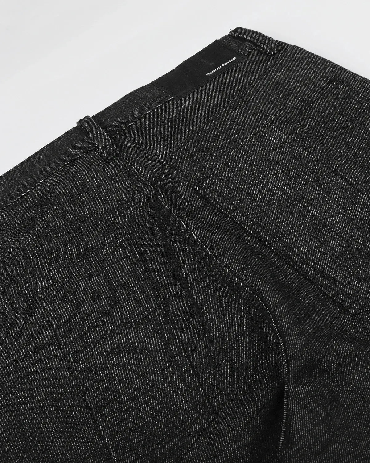 Black Flation Button Detail Deconstructed Raw Baggy Jeans with relaxed fit and unique button accents, streetwear style.