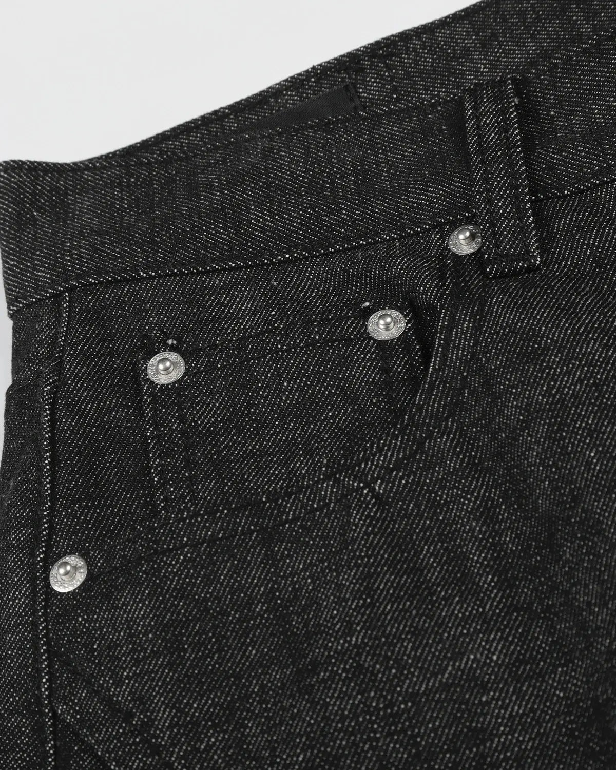 Black Button Detail Deconstructed Raw Baggy Jeans by Flation Streetwear, showing relaxed fit, raw edges, and button accents.