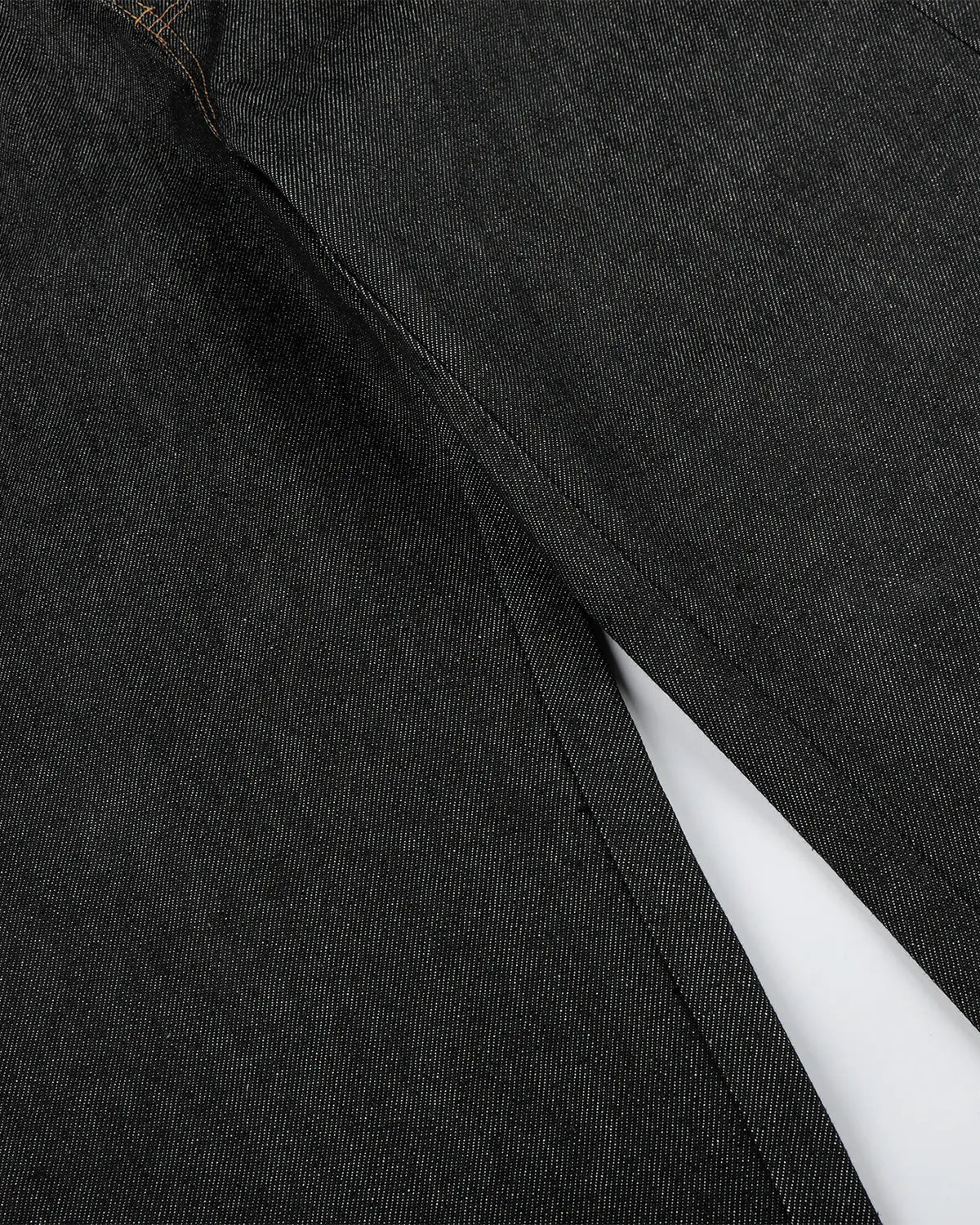 Black Flation streetwear baggy jeans with button fly, featuring a raw, relaxed fit and casual style.