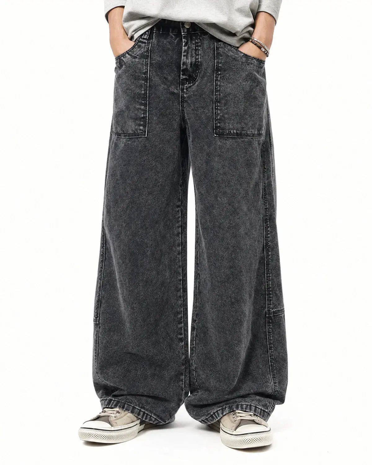 Deconstructed distressed barrel jeans by Flation Streetwear featuring frayed edges, ripped details, and a relaxed fit.