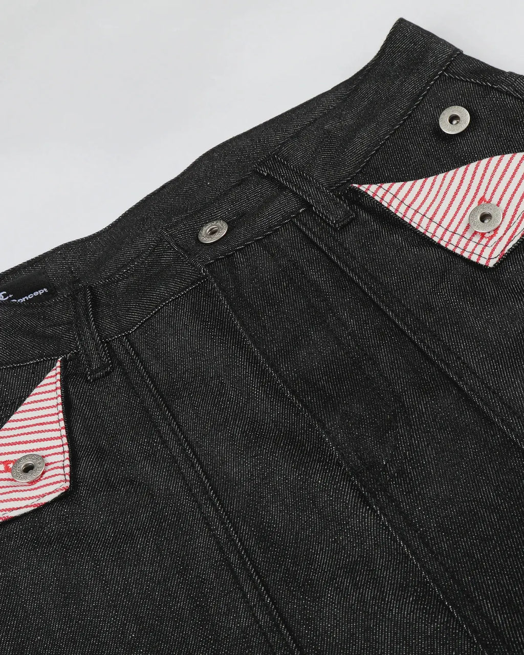 Black Deconstructed Utility Baggy Jeans by Flation Streetwear with multiple pockets and relaxed fit, showcasing urban street style.