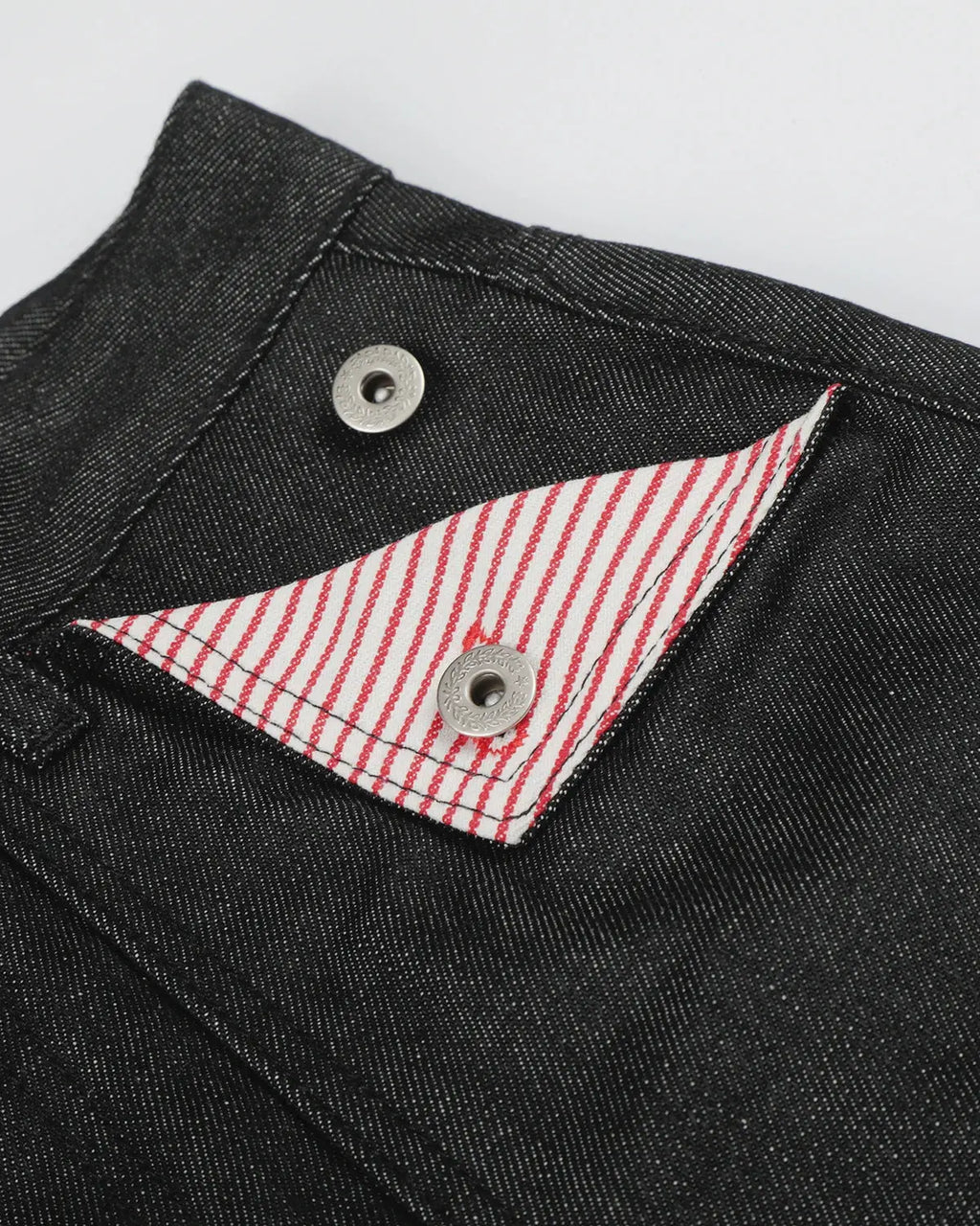 Black deconstructed utility baggy jeans by Flation Streetwear with relaxed fit and multiple pockets, casual urban style.