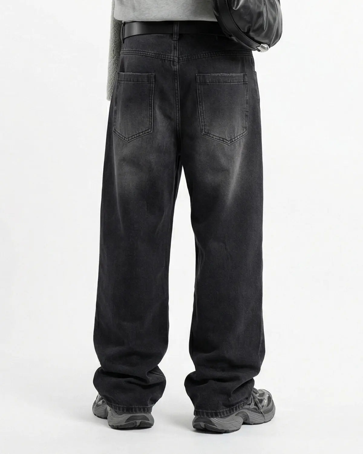 Distressed rhinestone ripped baggy jeans by Flation Streetwear featuring embellishments and a relaxed fit.