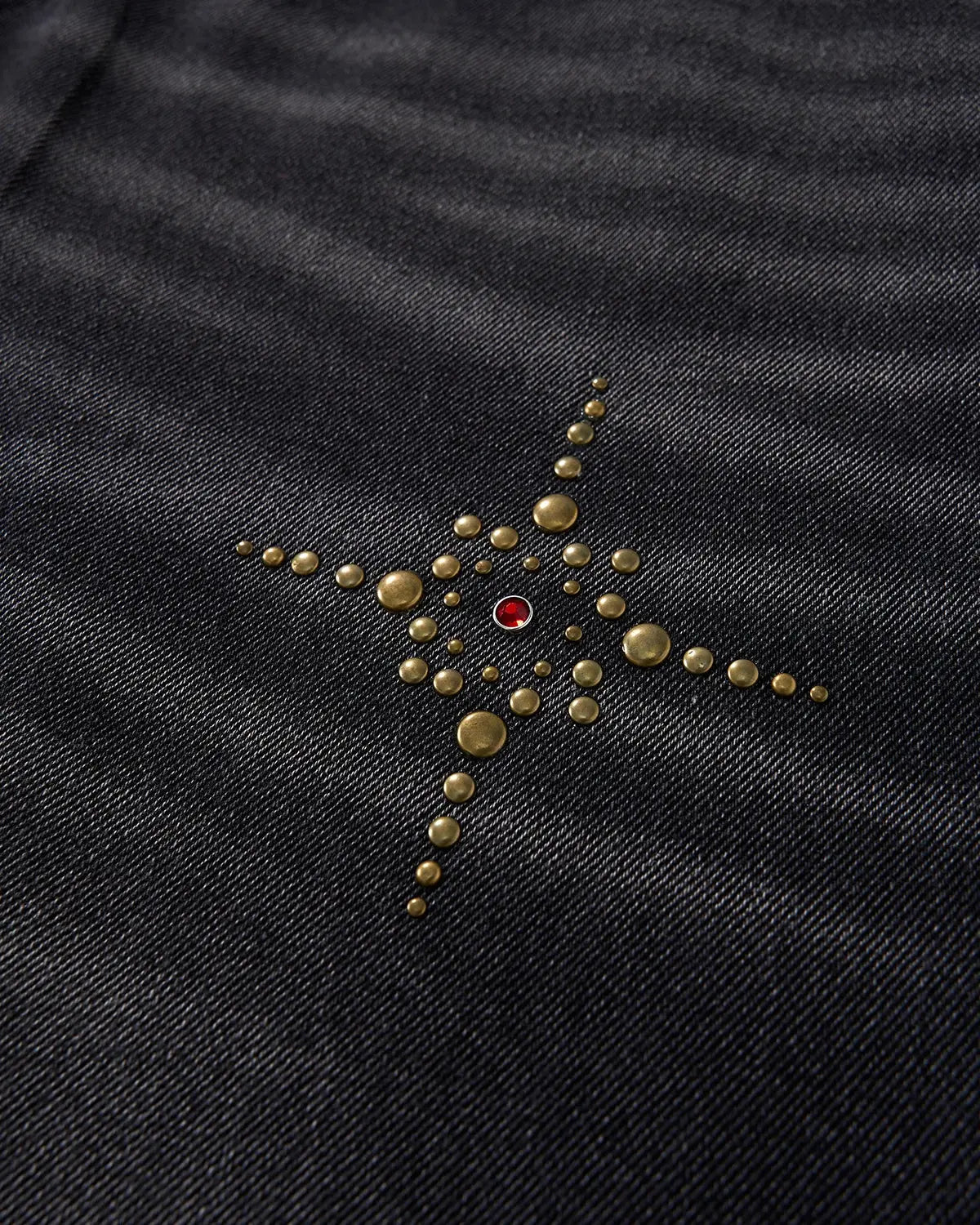 Flation distressed rhinestone ripped baggy jeans with frayed edges and embellishments, casual streetwear style.