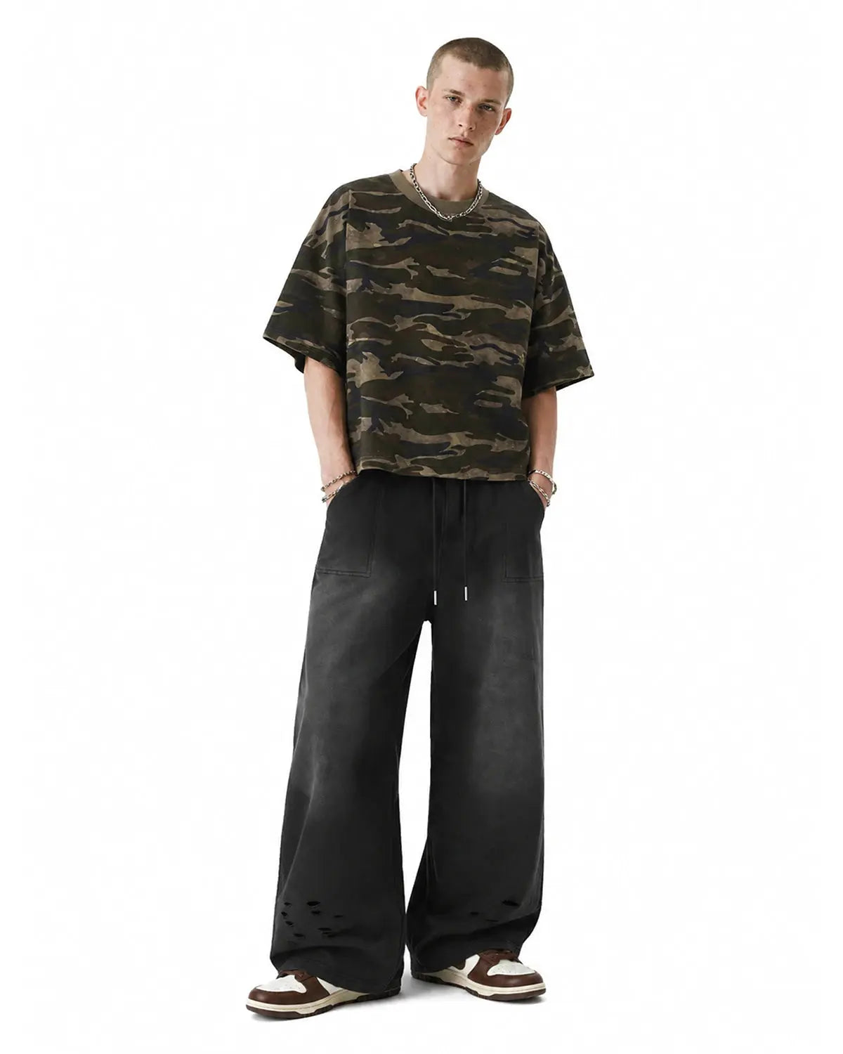 Black distressed washed baggy sweatpants by Flation Streetwear with a relaxed fit and casual style.