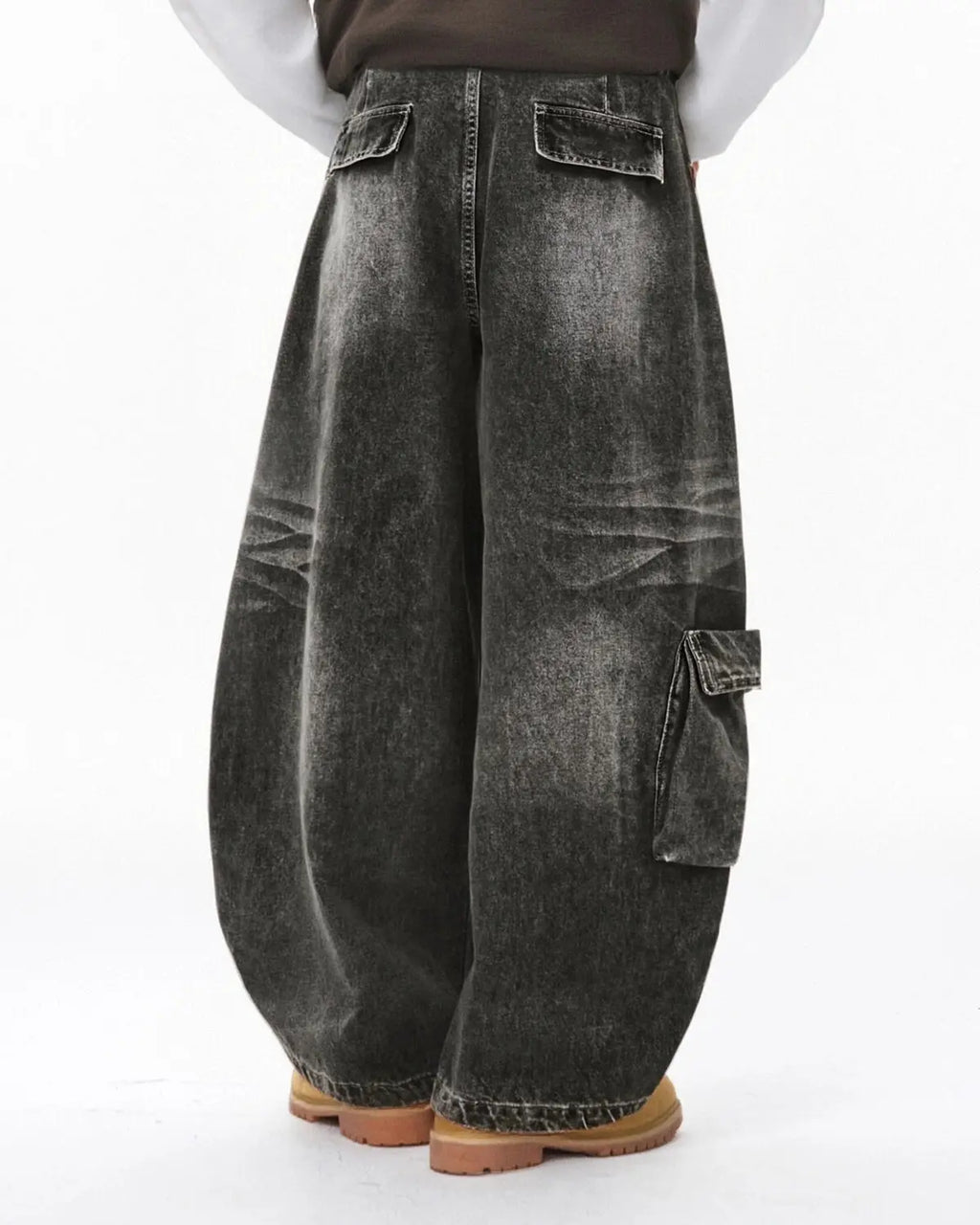 Black distressed washed cargo barrel jeans by Flation Streetwear, featuring a relaxed fit and rugged, stylish design.