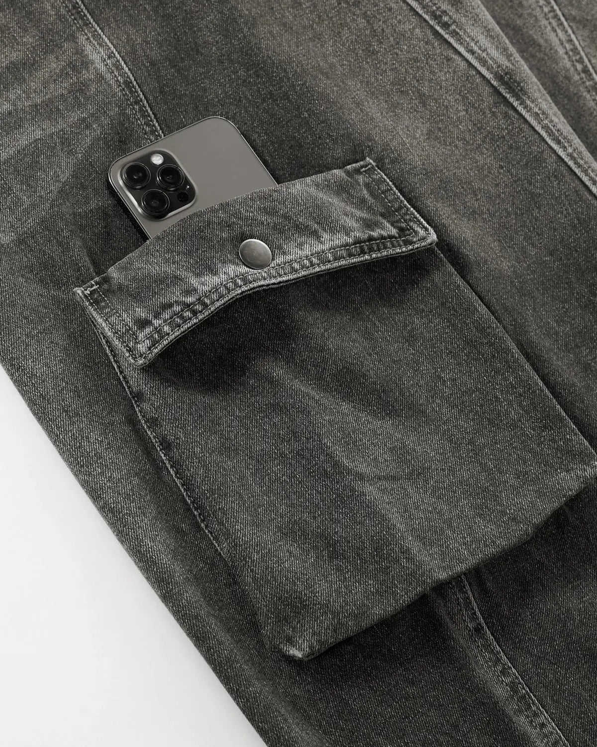 Black distressed washed cargo barrel jeans by Flation Streetwear with a relaxed fit and rugged, stylish design.