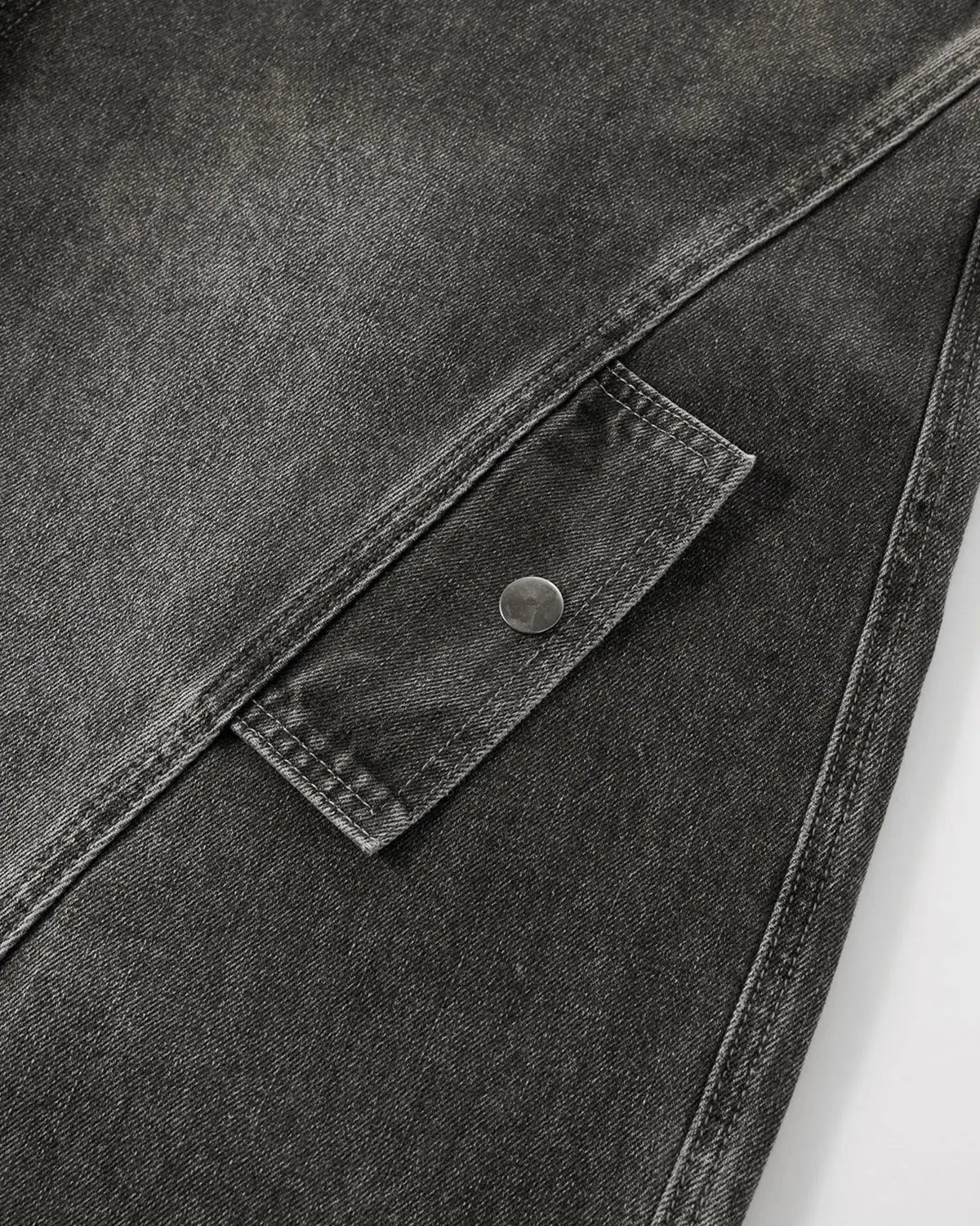 Black distressed washed cargo barrel jeans by Flation Streetwear, featuring a relaxed fit and rugged style.