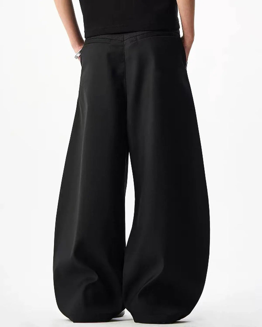 Wide-leg tailored pants with a rope belt from Flation Streetwear, shown in a neutral color, styled for a modern streetwear look.