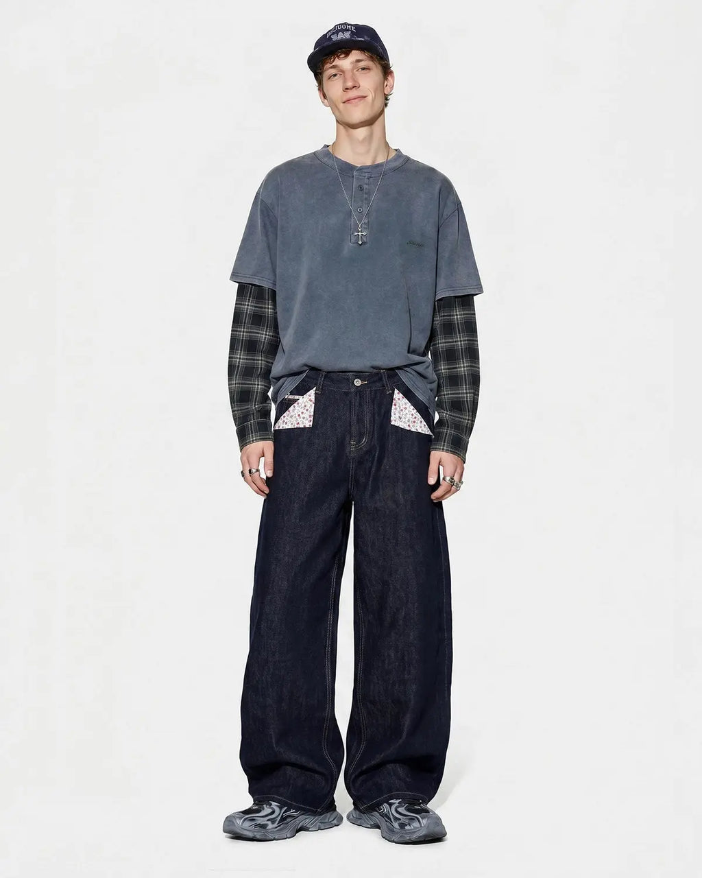 Black selvedge buckle baggy jeans by Flation Streetwear, shown with relaxed fit and stylish design details.