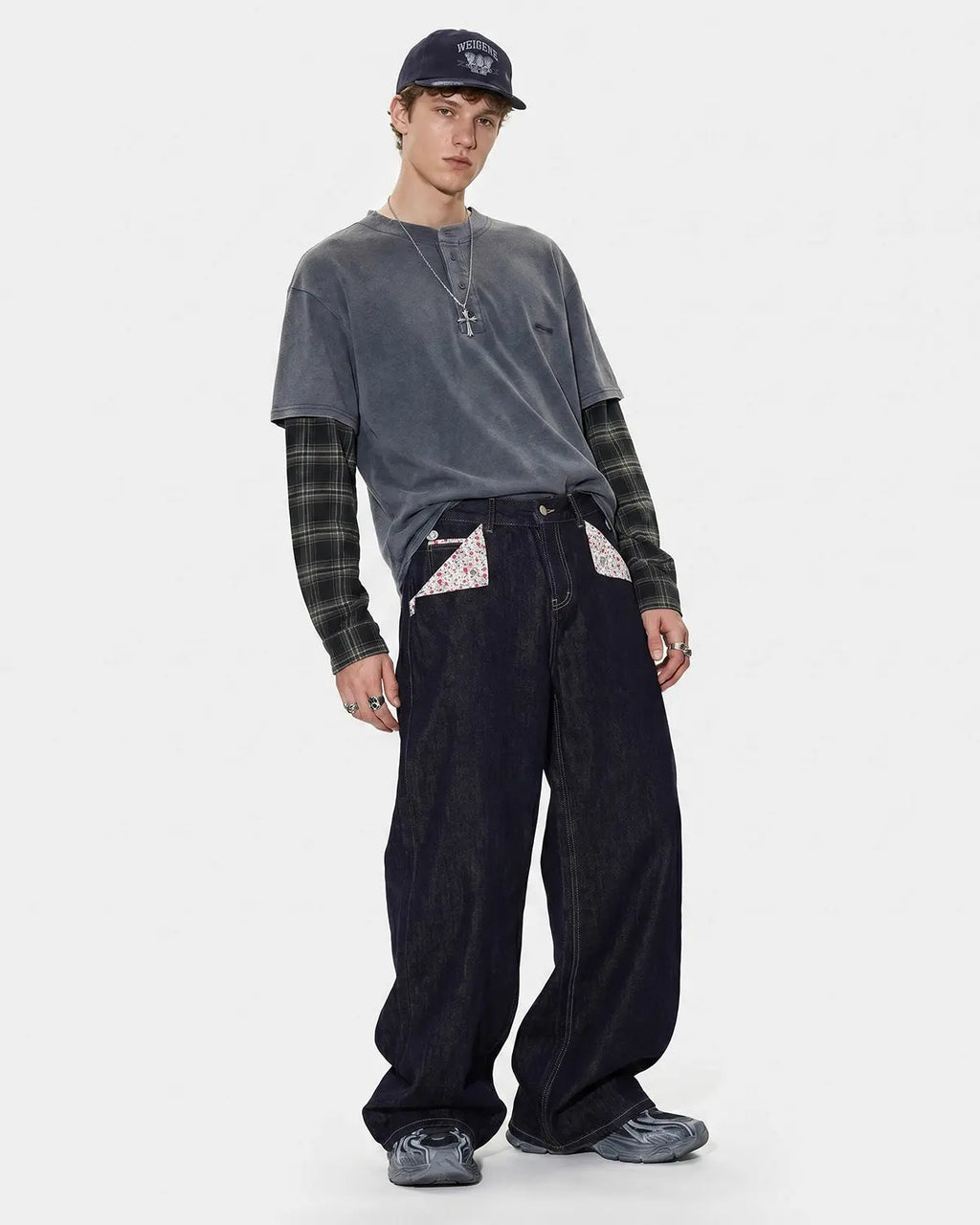 Black selvedge buckle baggy jeans by Flation Streetwear, featuring a relaxed fit and sturdy denim with visible selvedge edge.