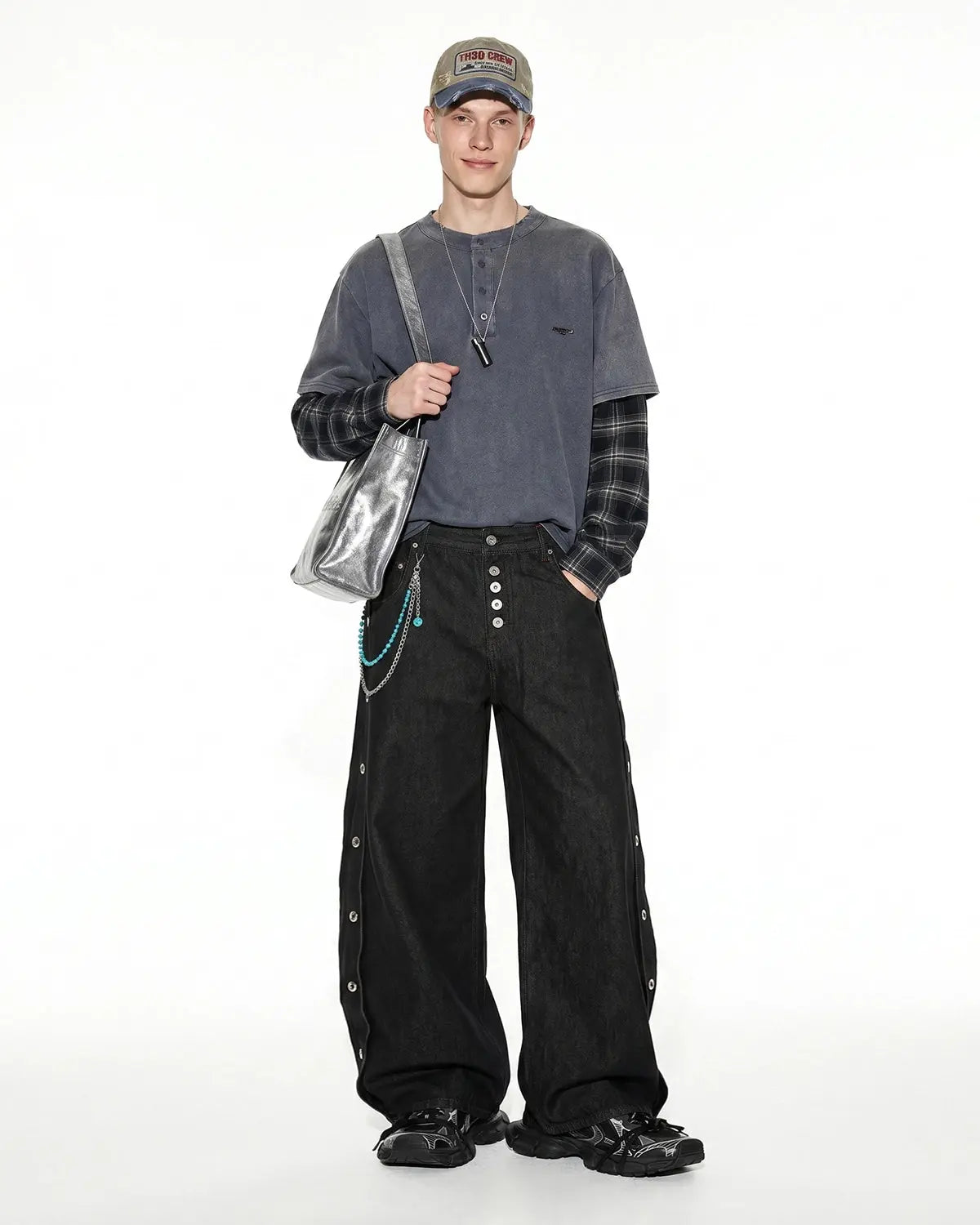 Flation Side Eyelet Buttons Barrel Jeans showing classic denim with side eyelet accents and relaxed fit, streetwear style.
