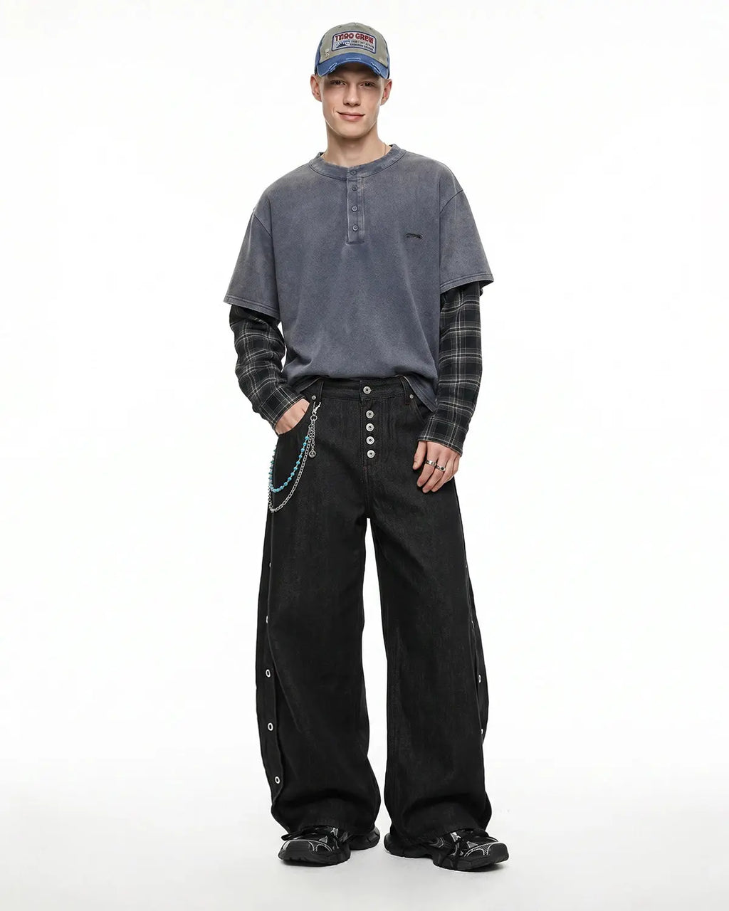 Flation Streetwear barrel jeans featuring side eyelet buttons, casual fit, and distressed denim style.