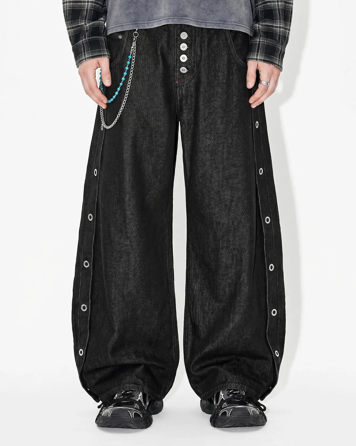 Flation Side Eyelet Buttons Barrel Jeans showing the stylish denim with eyelet button accents and classic barrel leg design.