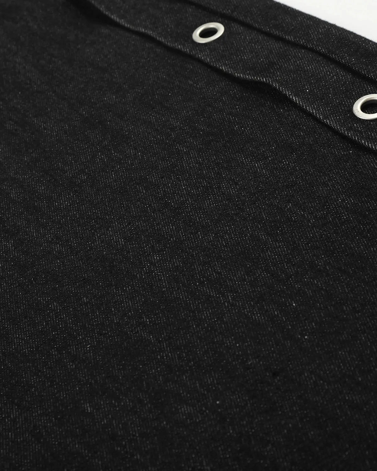Dark blue Flation Streetwear barrel jeans with side eyelet buttons and classic denim texture, styled for casual streetwear.