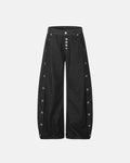 Flation Side Eyelet Buttons Barrel Jeans showing the stylish denim with eyelet button details and relaxed fit.