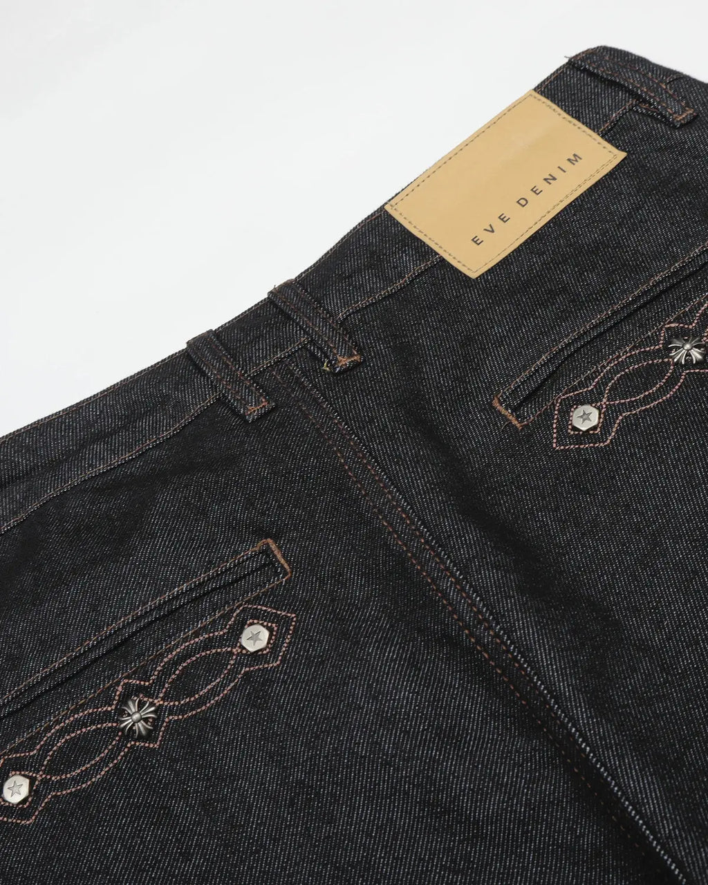 Black vintage embroidered bootcut jeans by Flation Streetwear with detailed embroidery and classic fit.