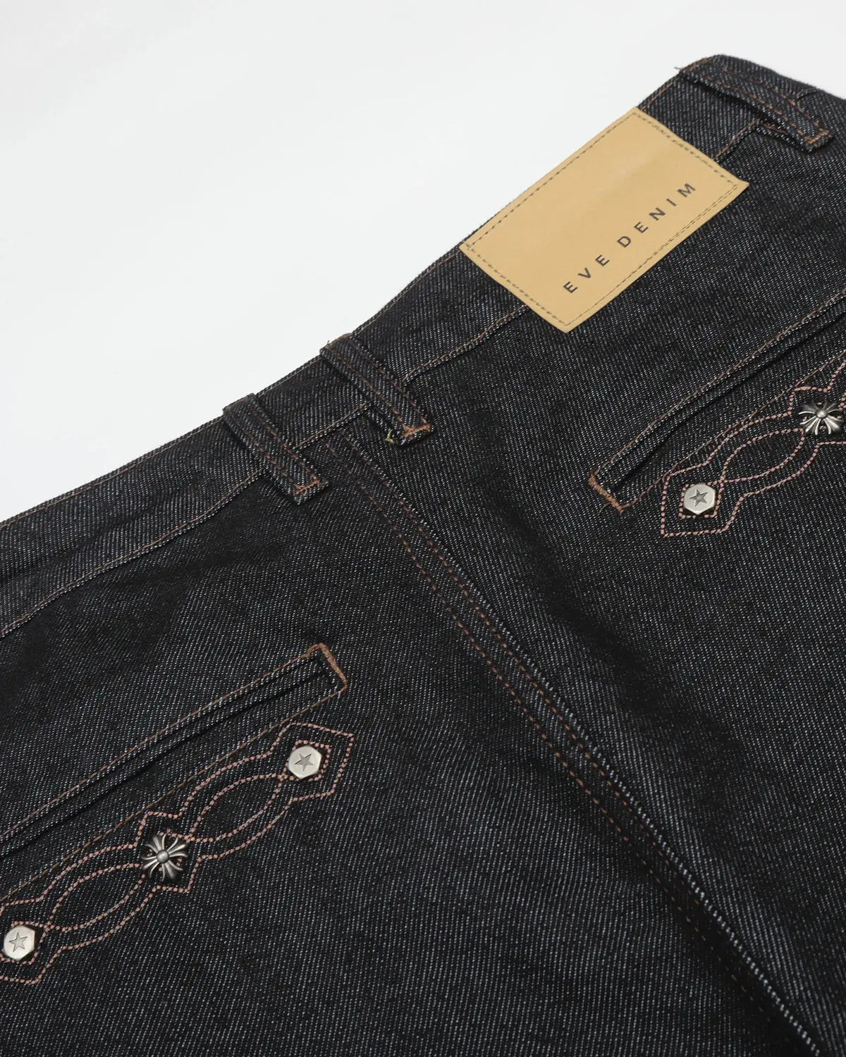 Black vintage embroidered bootcut jeans by Flation Streetwear with detailed embroidery and classic fit.