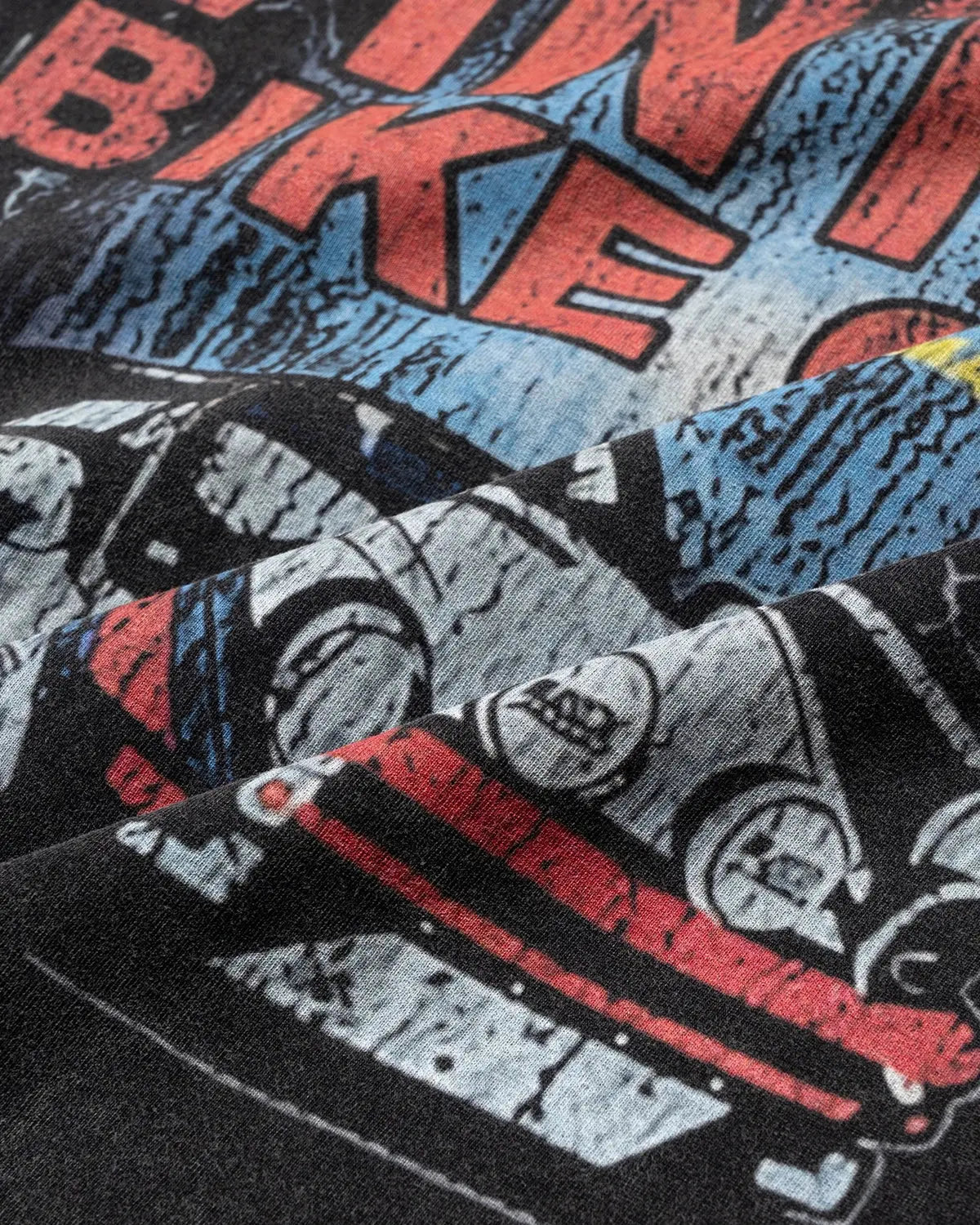 Black vintage graphic snow-washed T-shirt by Flation Streetwear featuring retro-inspired design and casual street style.