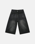 Black washed baggy denim jorts by Flation Streetwear, featuring a relaxed fit and distressed denim style.