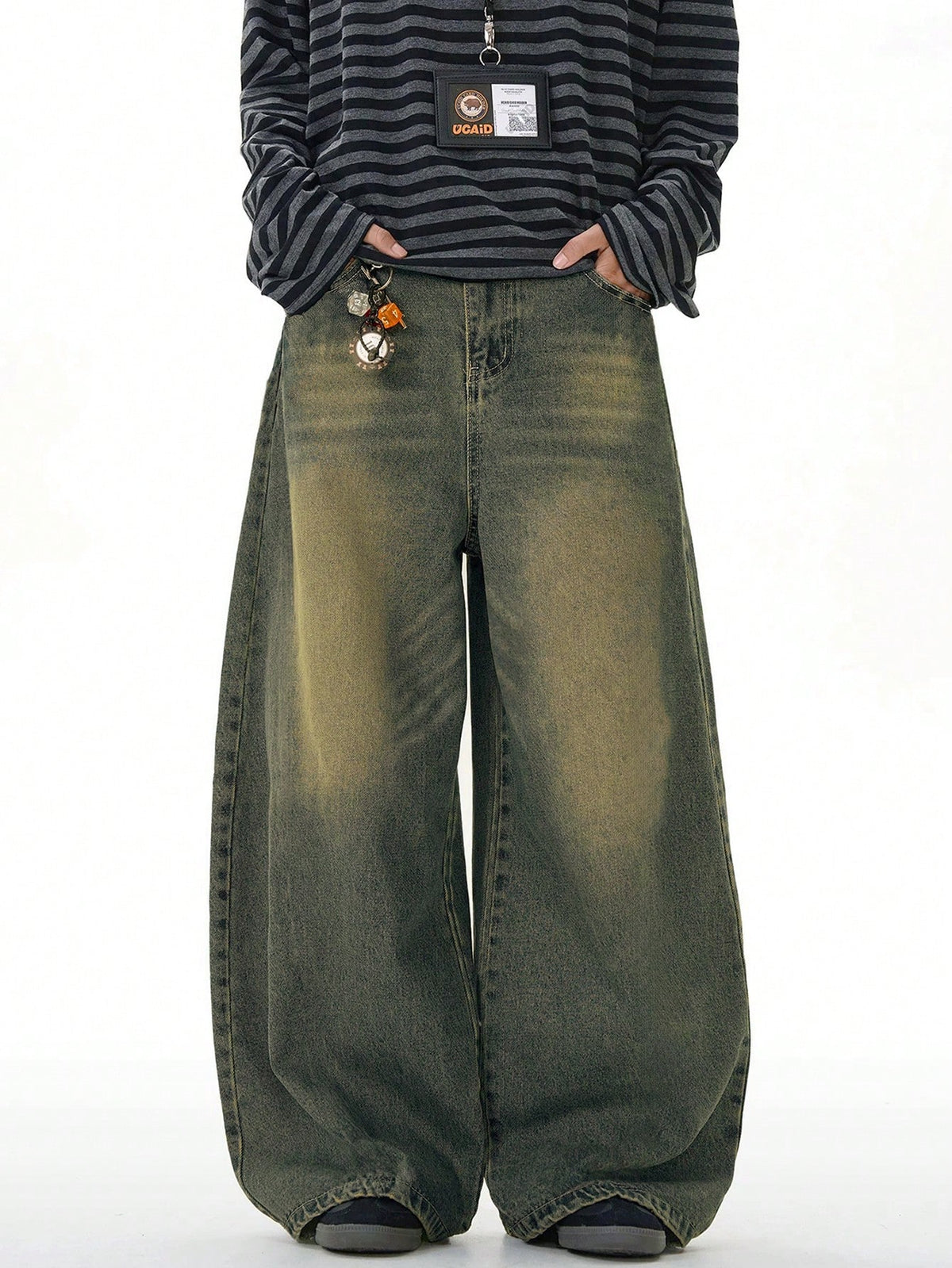 Black Flation wide-leg loose fit distressed vintage denim jeans, showcasing relaxed fit and distressed detailing.