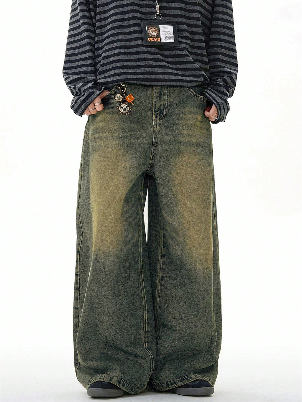 Black Flation wide-leg loose-fit distressed vintage denim jeans, showcasing relaxed fit and distressed details.