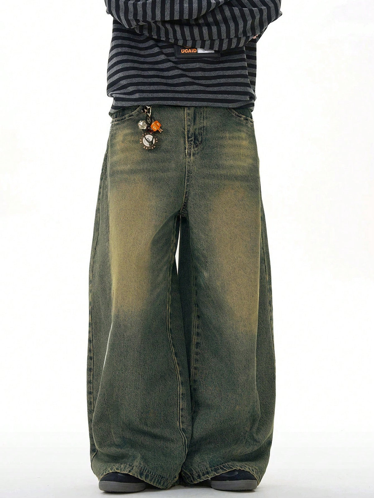 Black Flation wide-leg loose fit distressed vintage denim jeans displayed on a model.