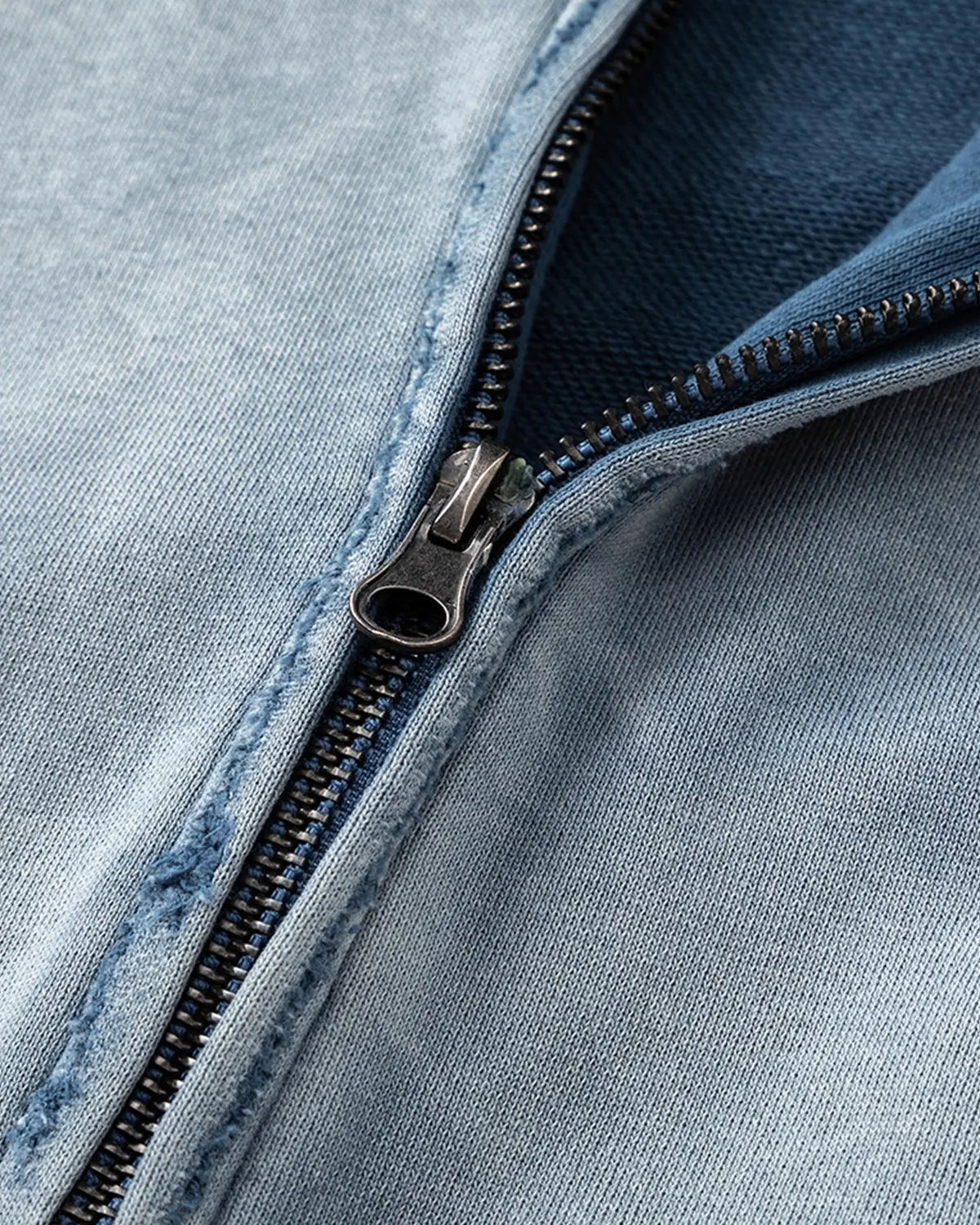 Blue distressed acid wash zip-up hoodie by Flation Streetwear, featuring a casual fit and front zipper detail.
