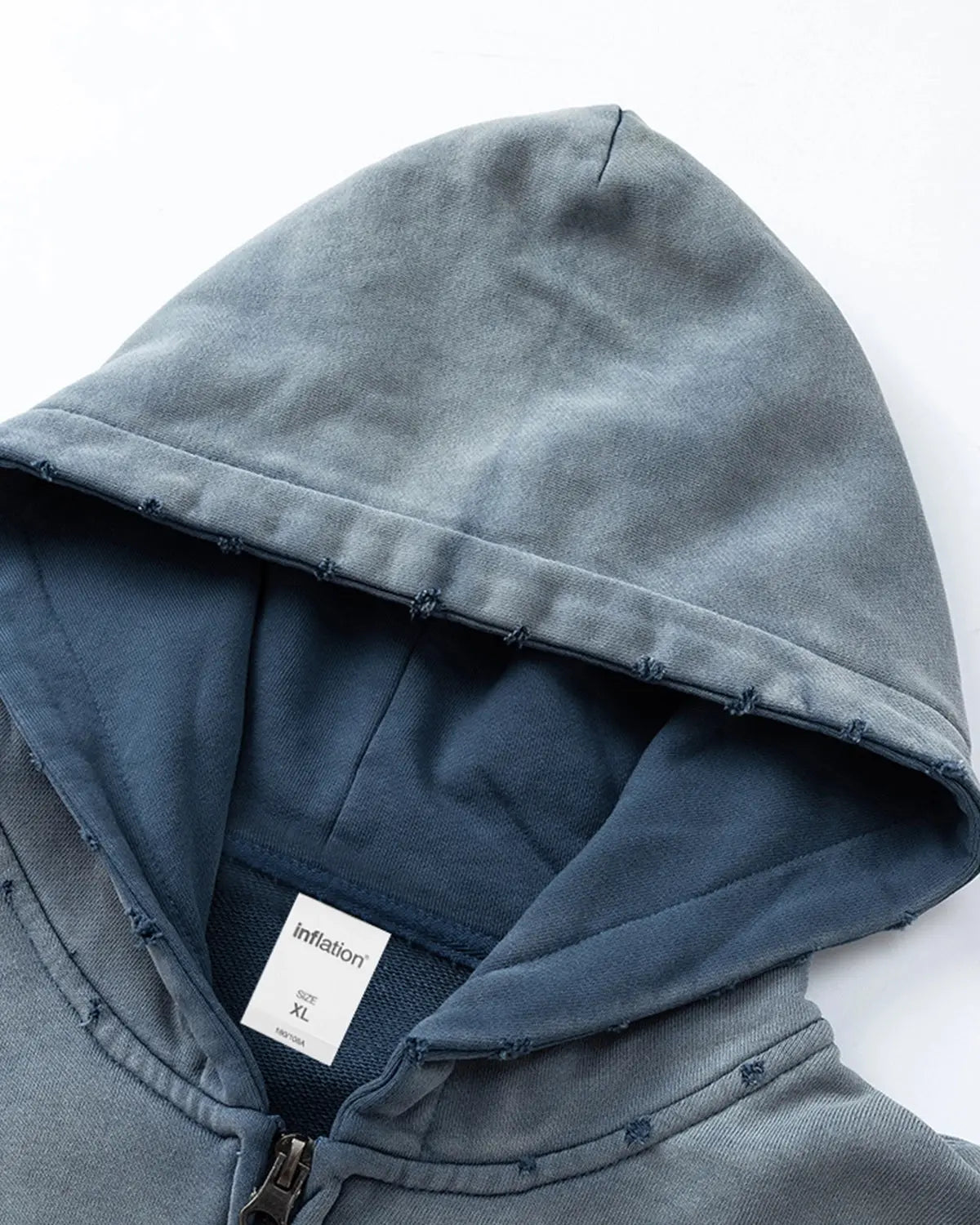 Blue distressed acid wash zip-up hoodie by Flation Streetwear, featuring a casual fit and front zipper for a trendy street style look.