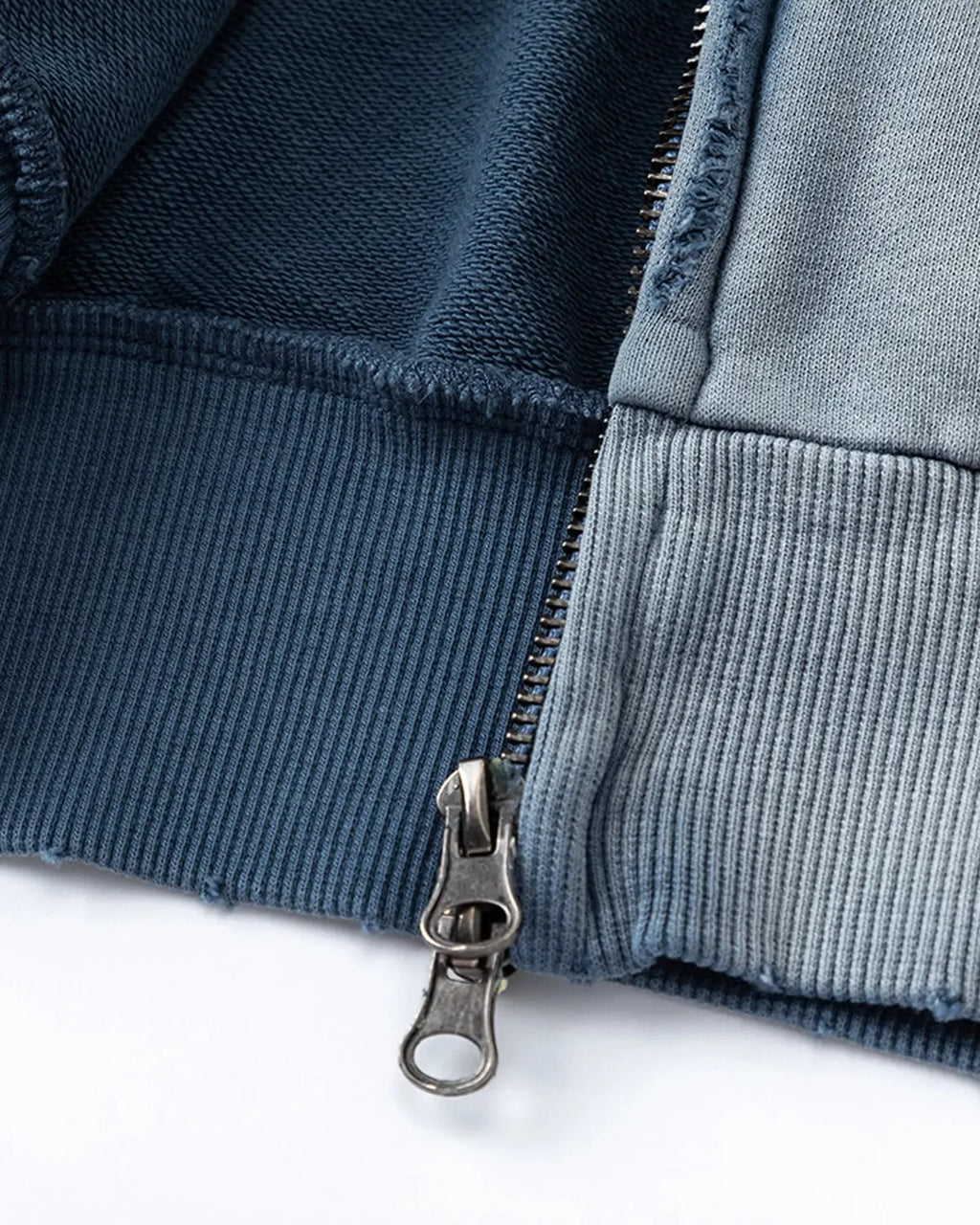 Blue distressed acid wash zip-up hoodie from Flation Streetwear with a casual fit and front pockets.