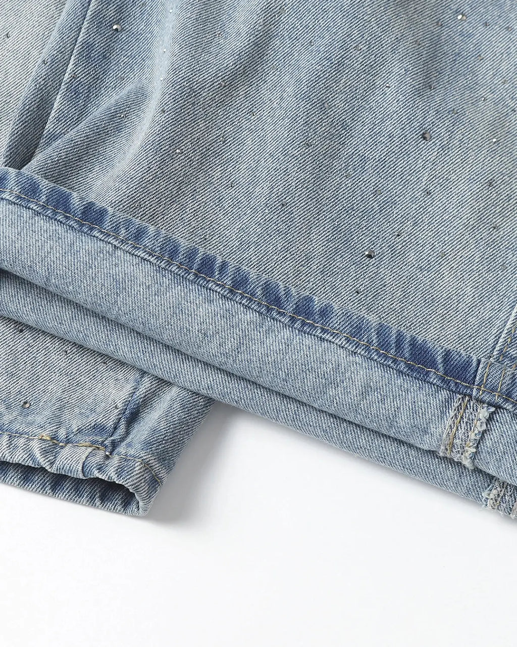 Flation rhinestone baggy barrel jeans with distressed details and wide fit, showcasing the stylish streetwear design and embellishments.