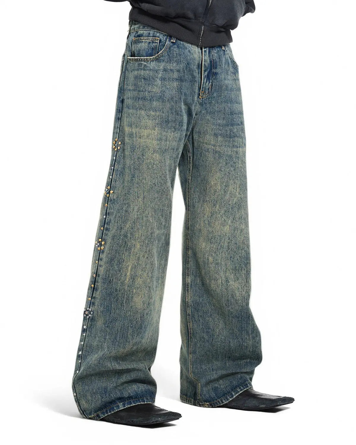 Blue acid wash beaded and studded flared baggy jeans by Flation streetwear, featuring a relaxed fit and stylish embellishments.