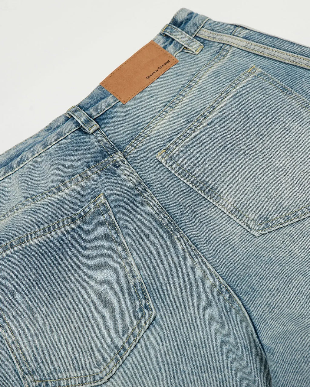 Blue acid wash striped side baggy jeans by Flation Streetwear featuring relaxed fit and casual street style.