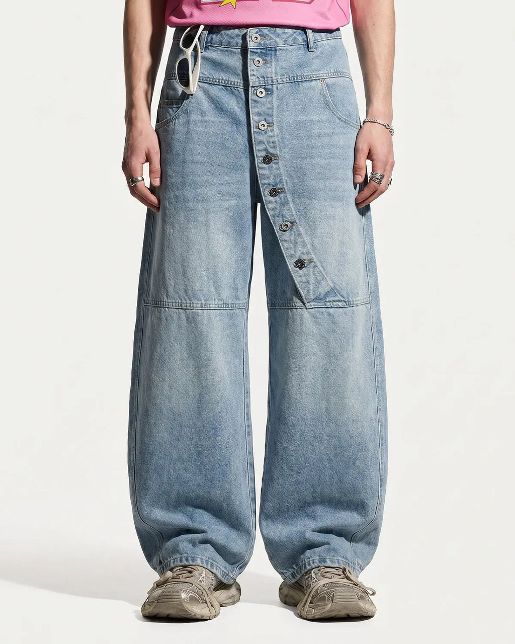 Blue asymmetric button baggy jeans by Flation Streetwear, featuring a relaxed fit and stylish design.