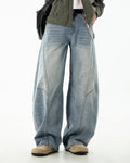 Blue Flation Curved Seam Deconstructed Barrel Jeans with streetwear style, featuring unique seam design and relaxed fit.