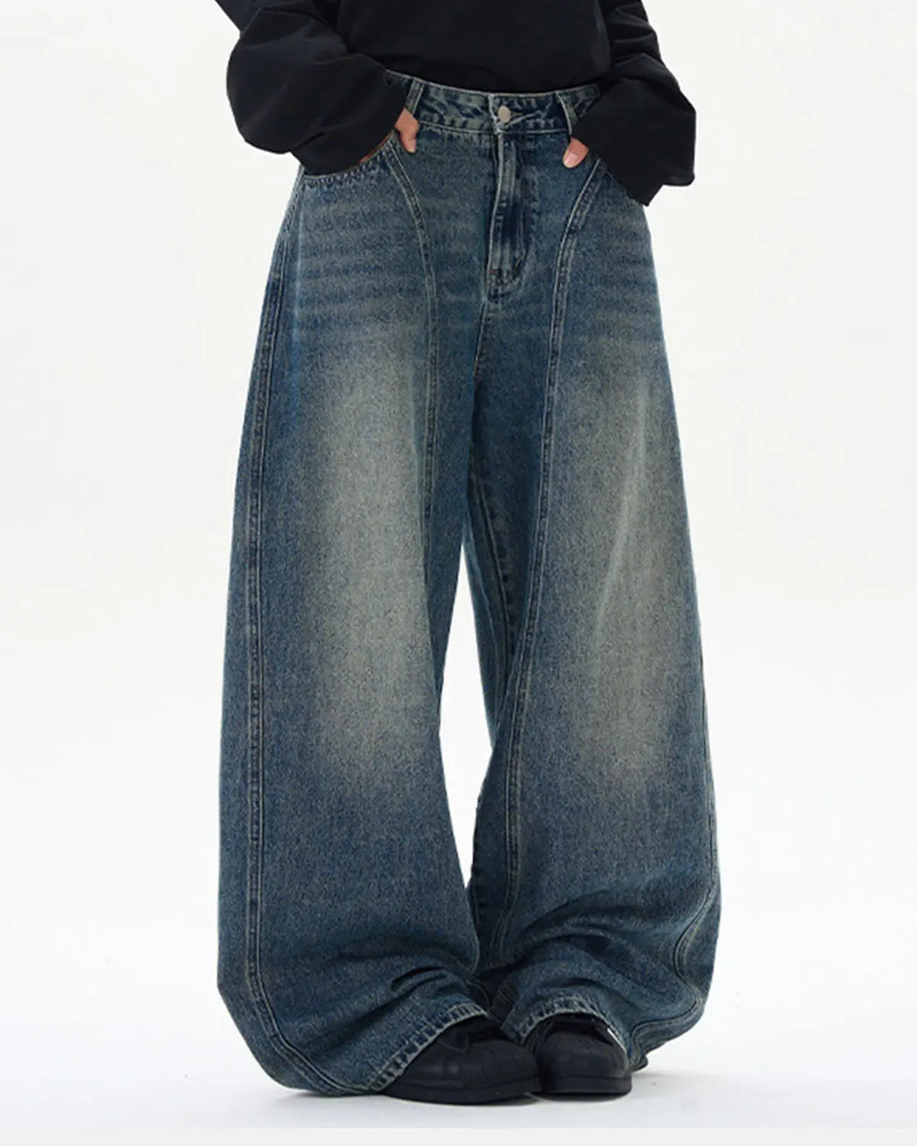 Light blue deconstructed washed barrel jeans by Flation Streetwear, with distressed details and relaxed fit.