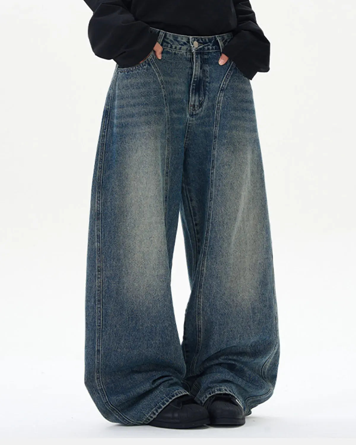 Light blue deconstructed washed barrel jeans by Flation Streetwear, with distressed details and relaxed fit.