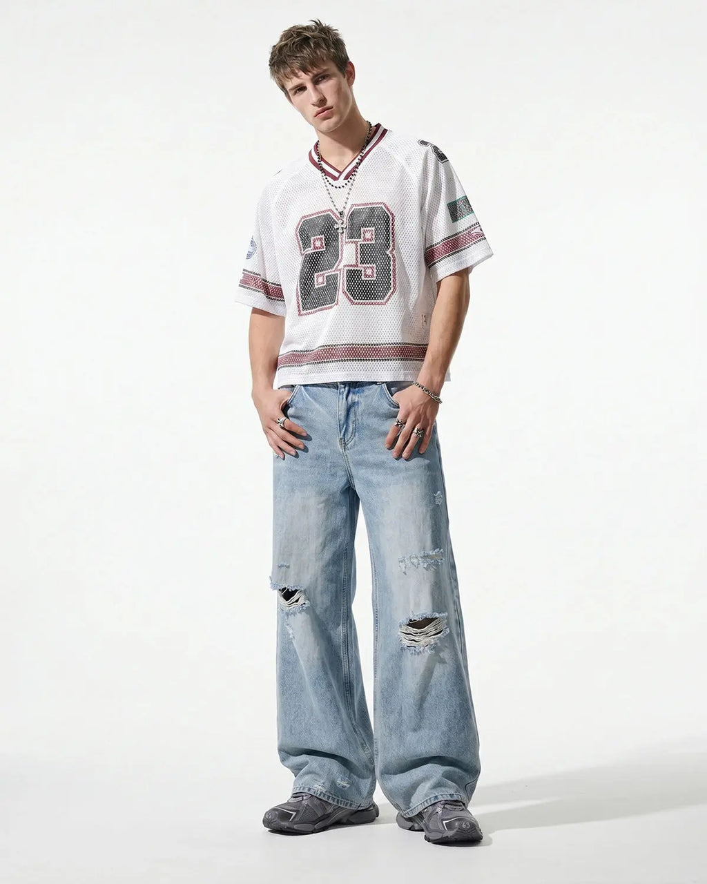 Blue Flation streetwear double waist distressed baggy jeans with ripped details and relaxed fit, showcasing casual urban style.