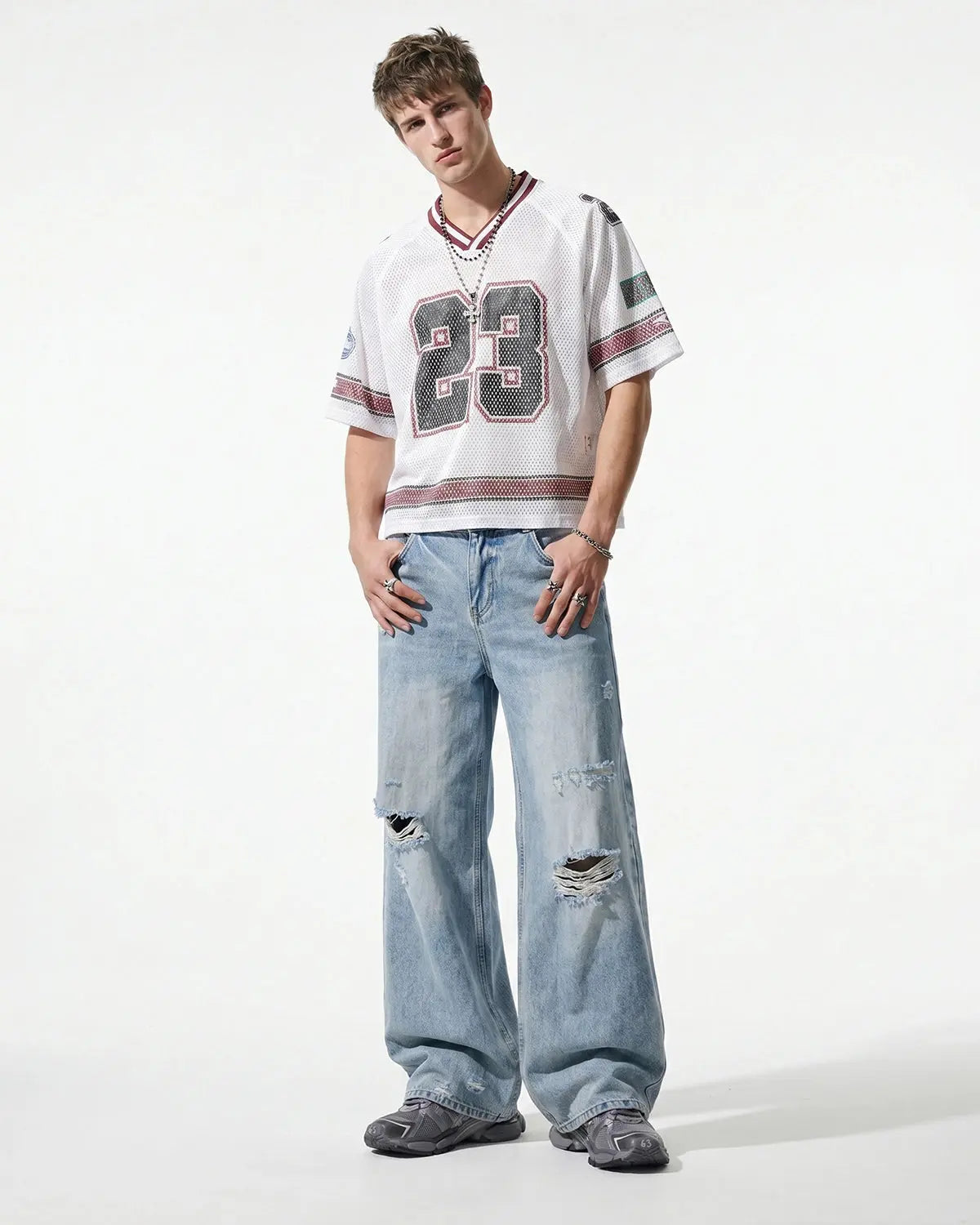 Blue Flation streetwear double waist distressed baggy jeans with ripped details and relaxed fit, showcasing casual urban style.
