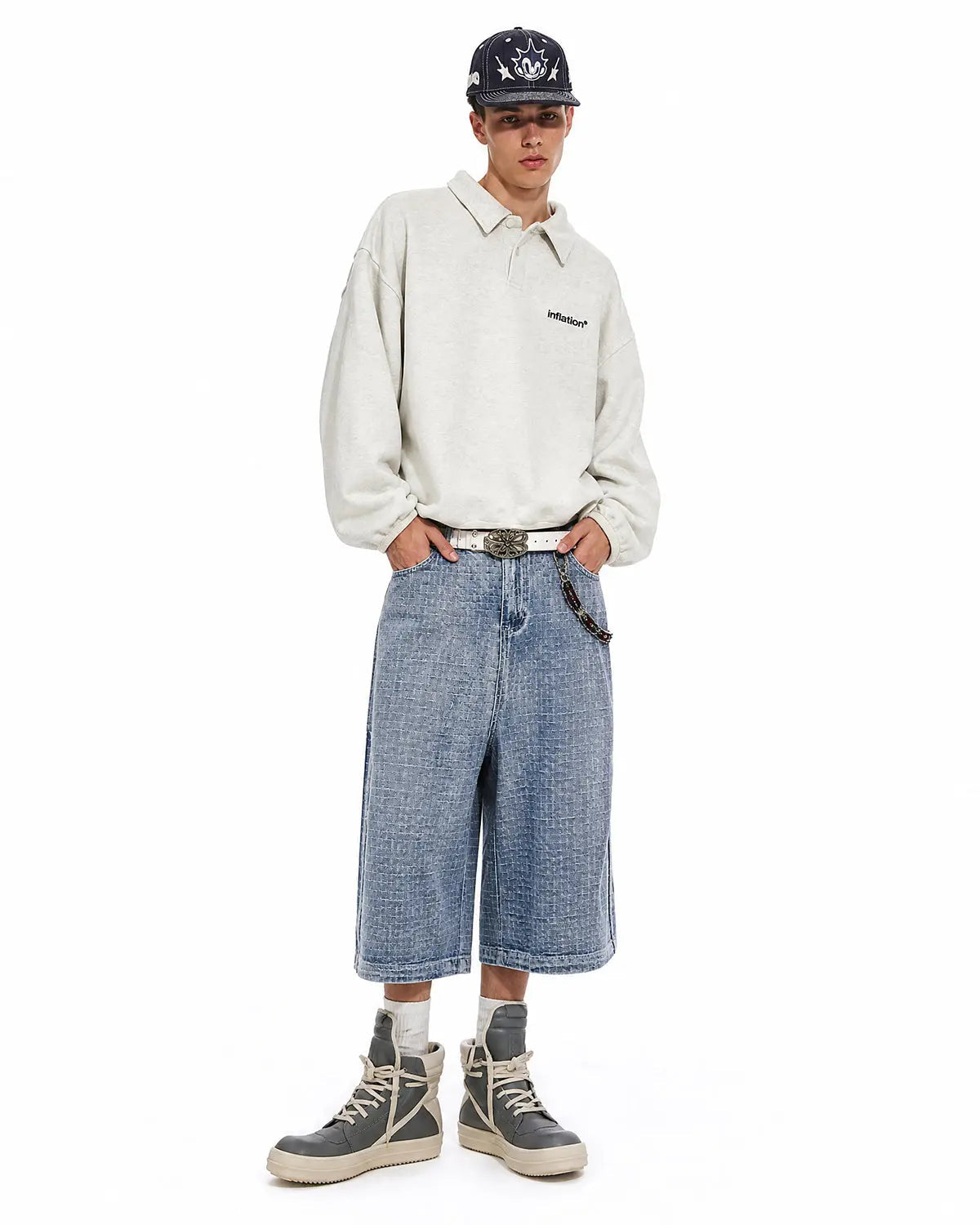 Blue grid texture baggy jorts by Flation Streetwear with a relaxed fit and casual design, perfect for streetwear style.