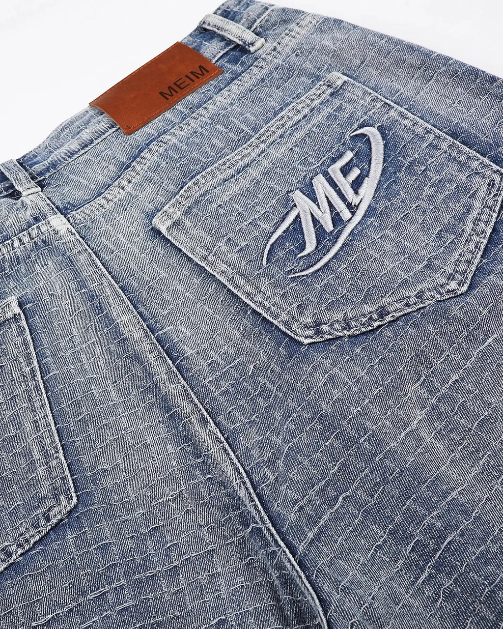 Blue grid texture baggy jorts by Flation Streetwear, featuring a relaxed fit and casual streetwear style.