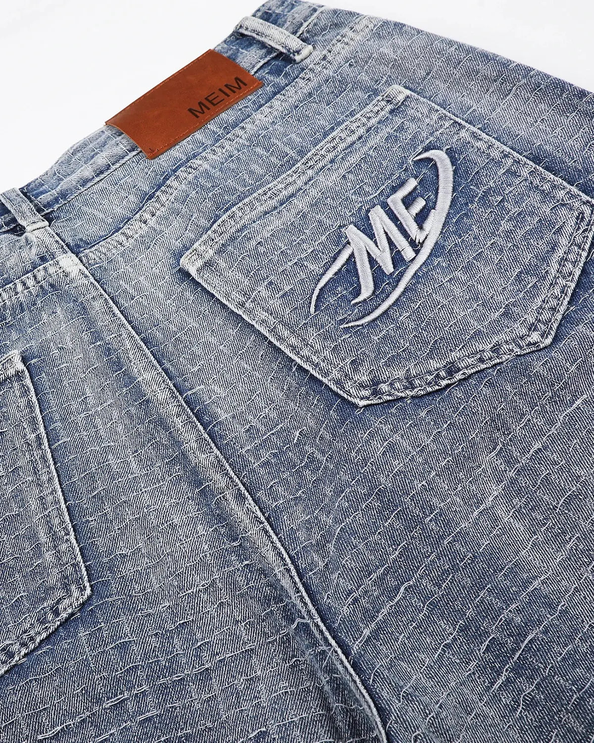 Blue grid texture baggy jorts by Flation Streetwear, featuring a relaxed fit and casual streetwear style.