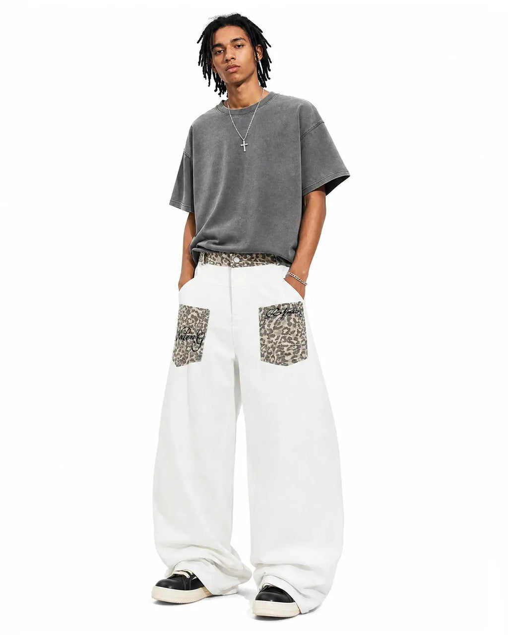 Blue leopard patch barrel jeans from Flation Streetwear featuring relaxed fit and stylish animal print design.