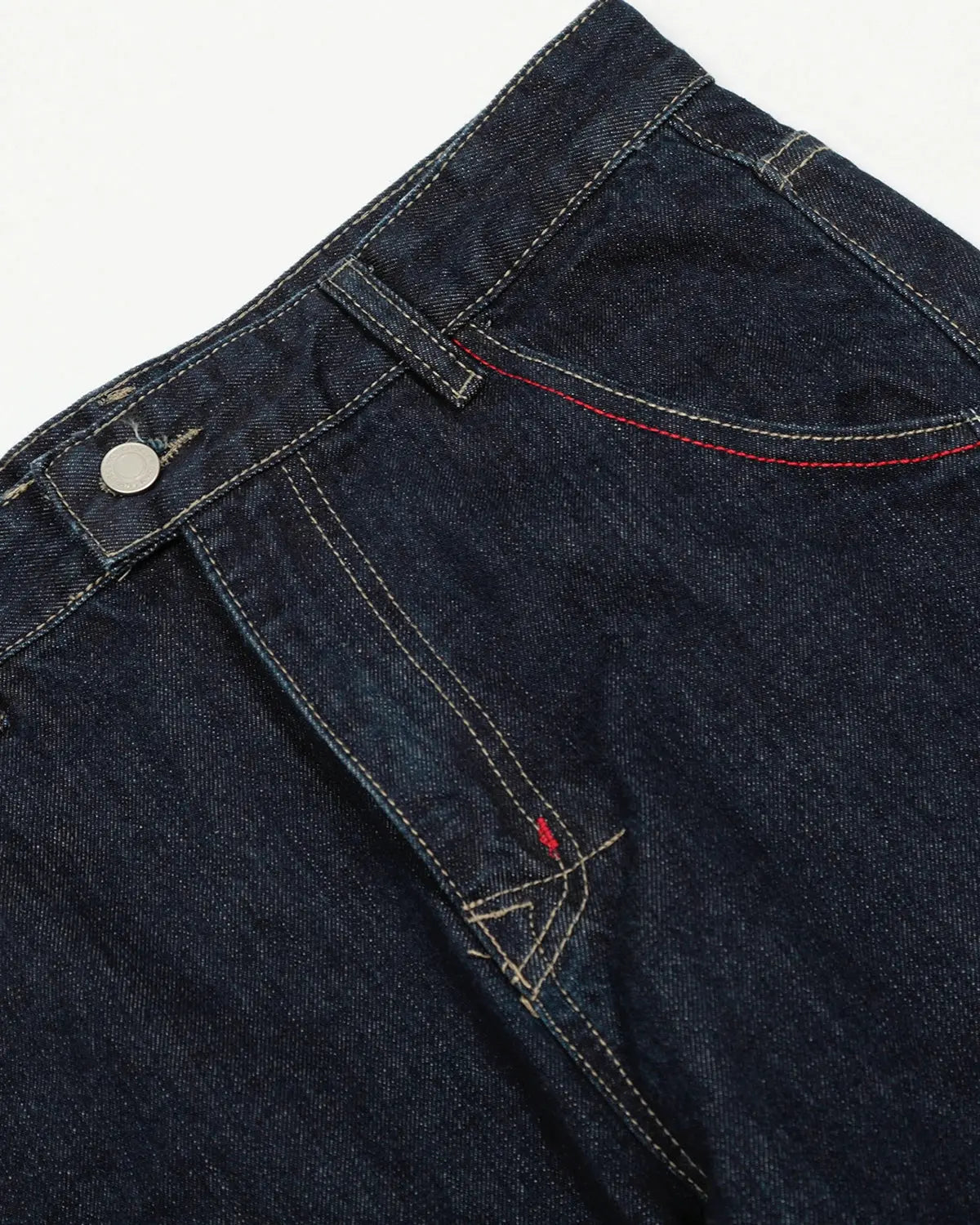 Raw blue deconstructed baggy jeans by Flation Streetwear, featuring relaxed fit and distressed denim details.
