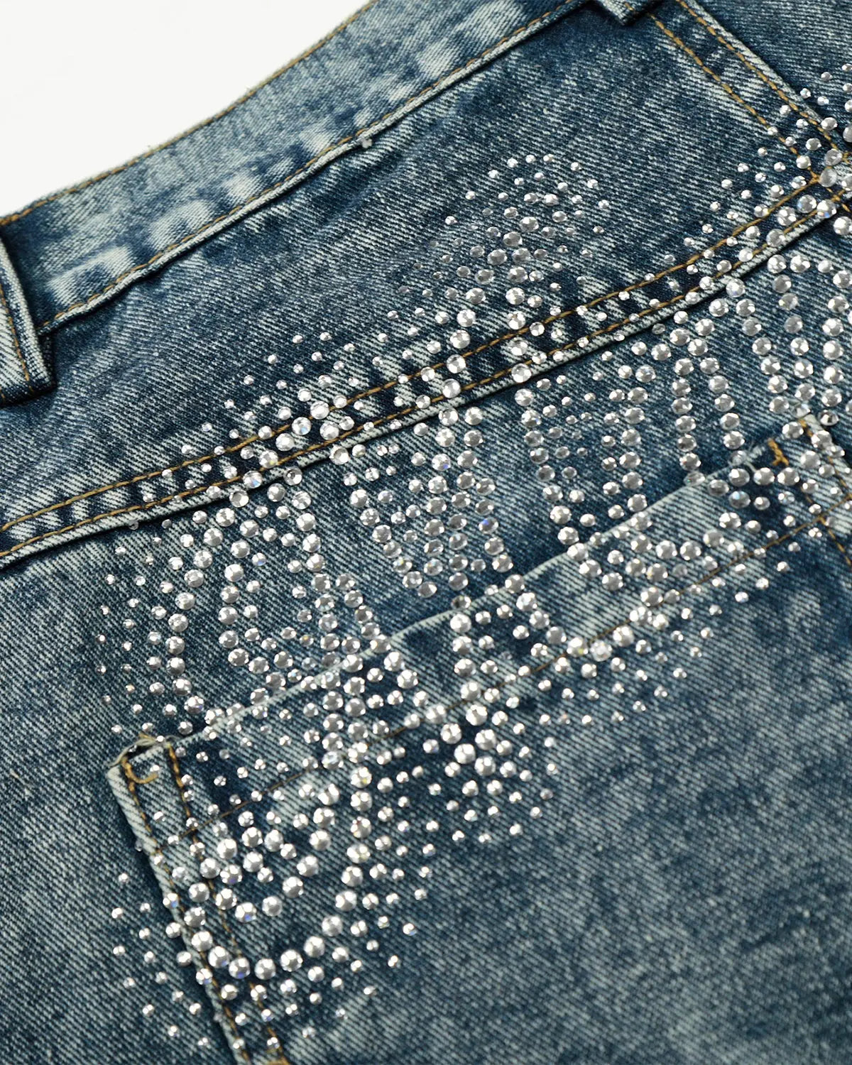 Rhinestone acid wash baggy jeans by Flation Streetwear featuring distressed denim and loose fit design.