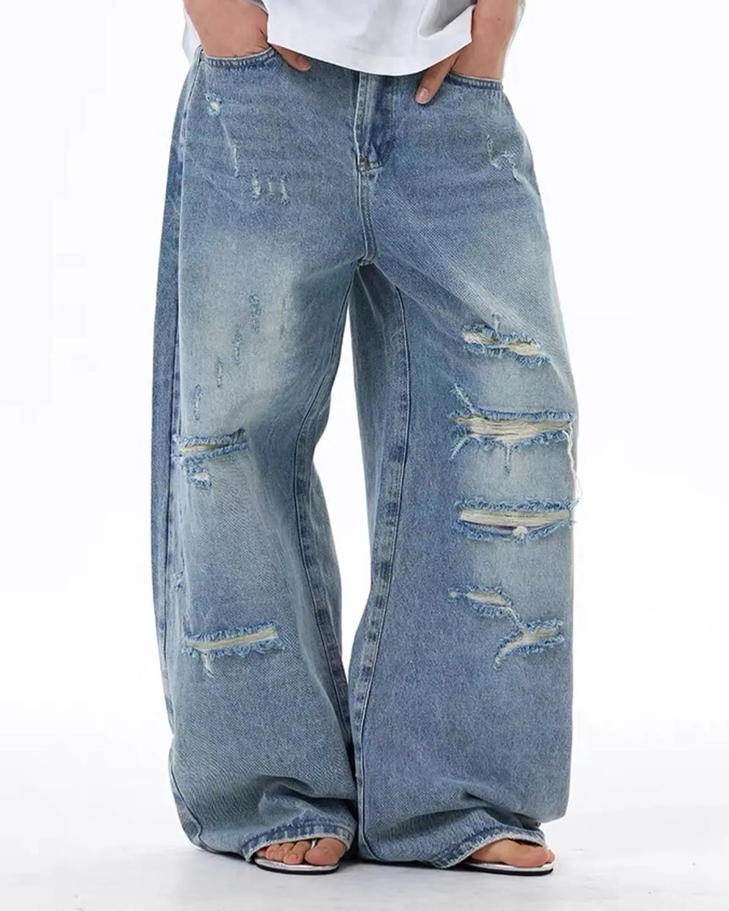 Flation vintage wash distressed baggy jeans, blue streetwear denim with a relaxed fit and distressed detailing.