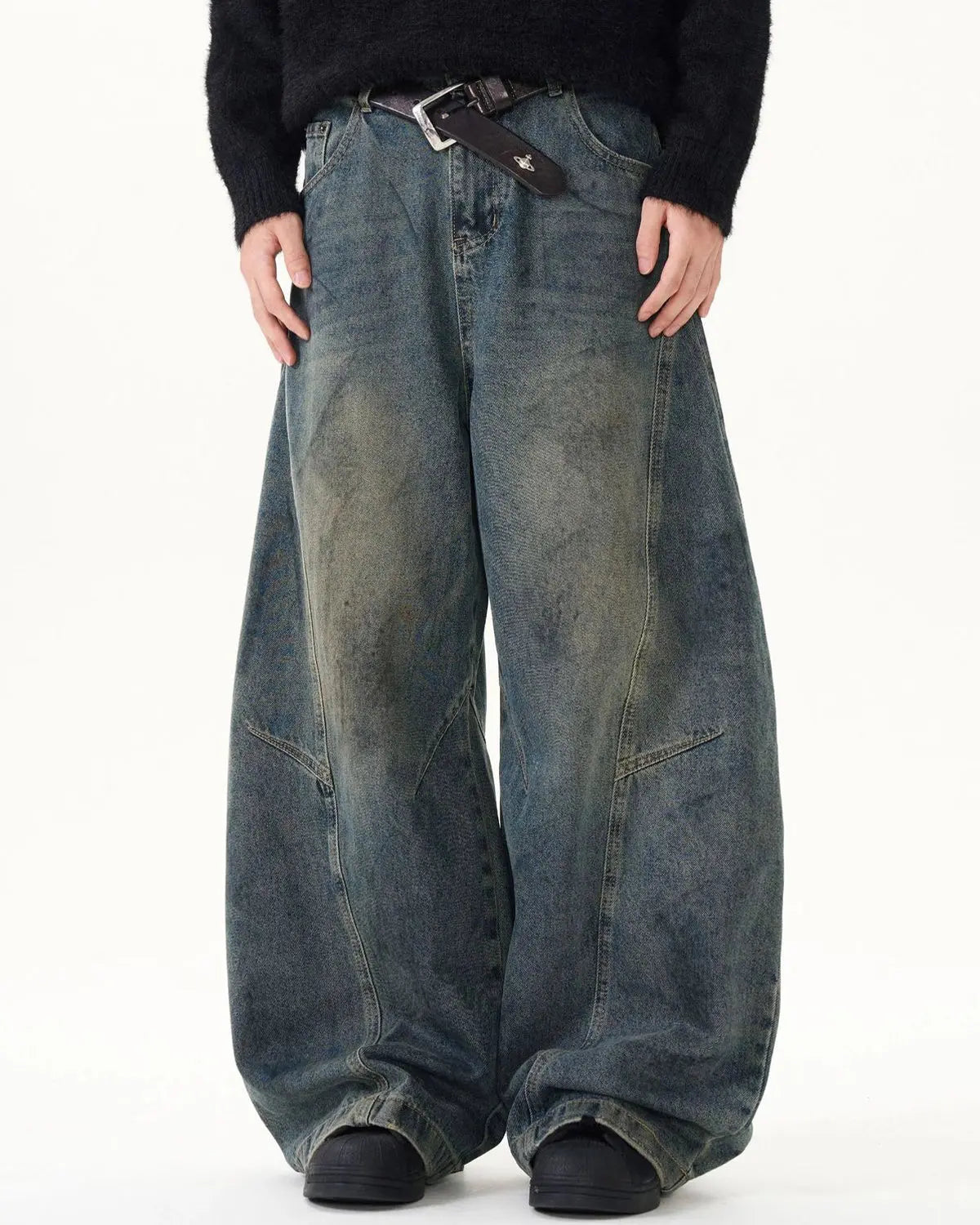 Blue washed deconstructed barrel jeans by Flation Streetwear featuring relaxed fit and distressed details.